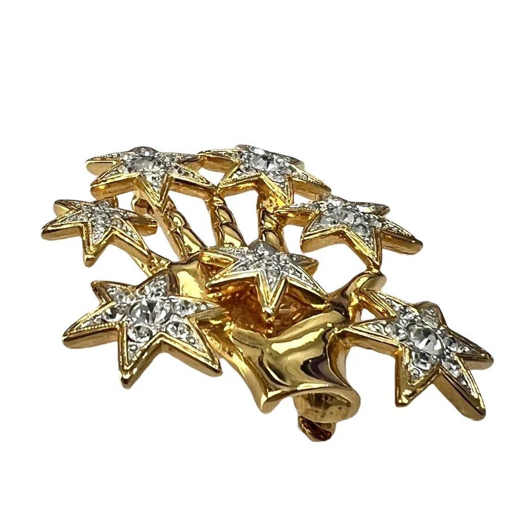 NOLAN MILLER SHINY GOLDEN HAND WITH CRYSTAL STARS BROOCH